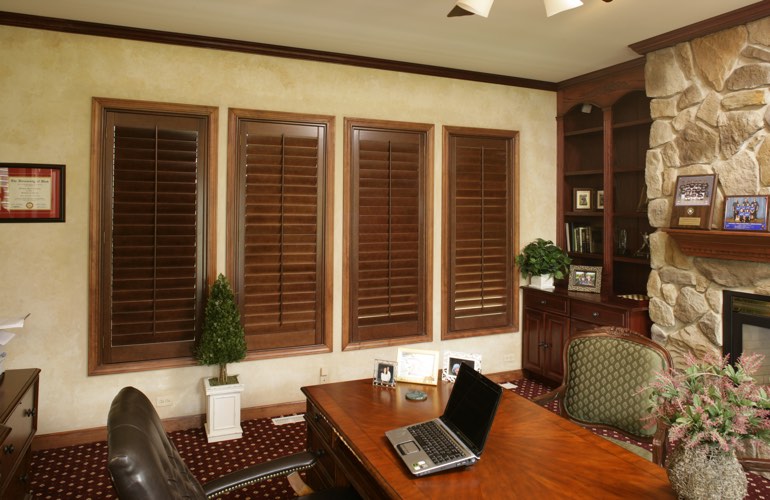 Hardwood plantation shutters in a San Diego home office